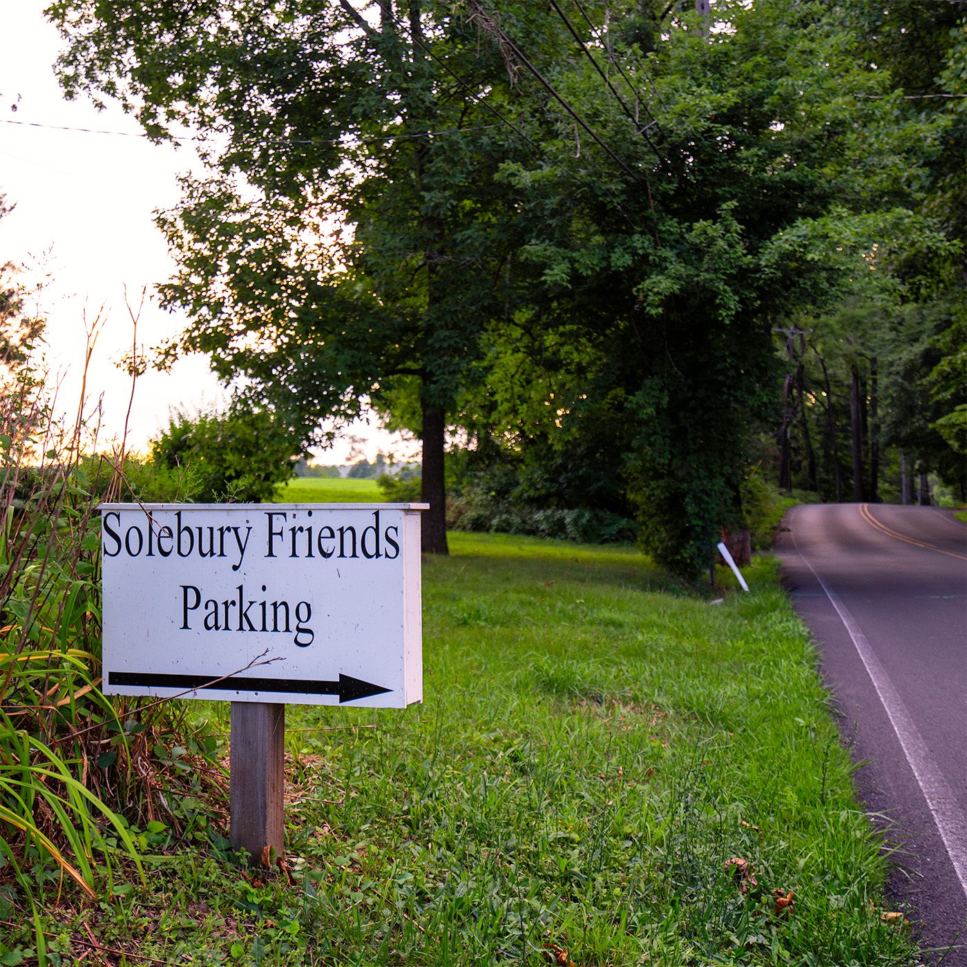 Solebury Friends Meeting Parking Sign Exterior view of Solebury Friends Meeting porch roof and sky
